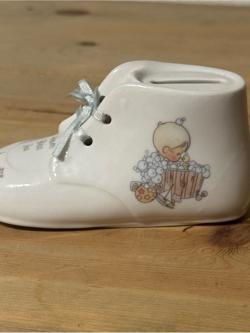 1990 Precious Moments "Heaven Bless You" porcelain baby shoe coin bank by Enesco